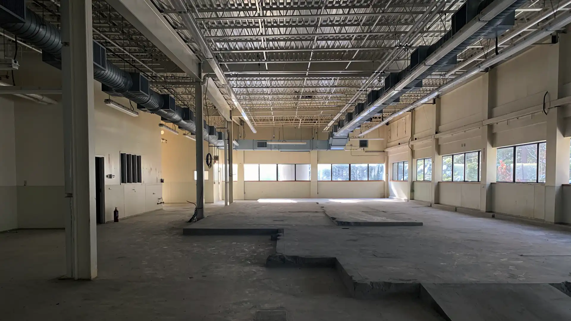 wide angle photo taken inside an empty factory building for a location scout to film bob anderson